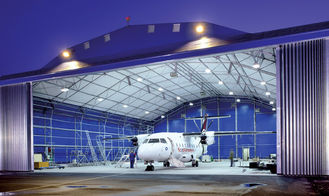 China Braguero construido edificios de acero longevos del tubo del hangar de los aviones de los sistemas del tejado proveedor